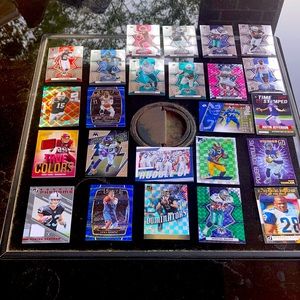 24 cards basketball and football cards